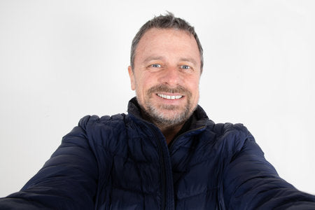 files/202225444-senior-middle-aged-man-handsome-make-cell-selfie-photo-with-mobile-phone-on-white-background.jpg